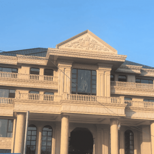 贵阳黄金麻别墅外墙干挂石材效果示例